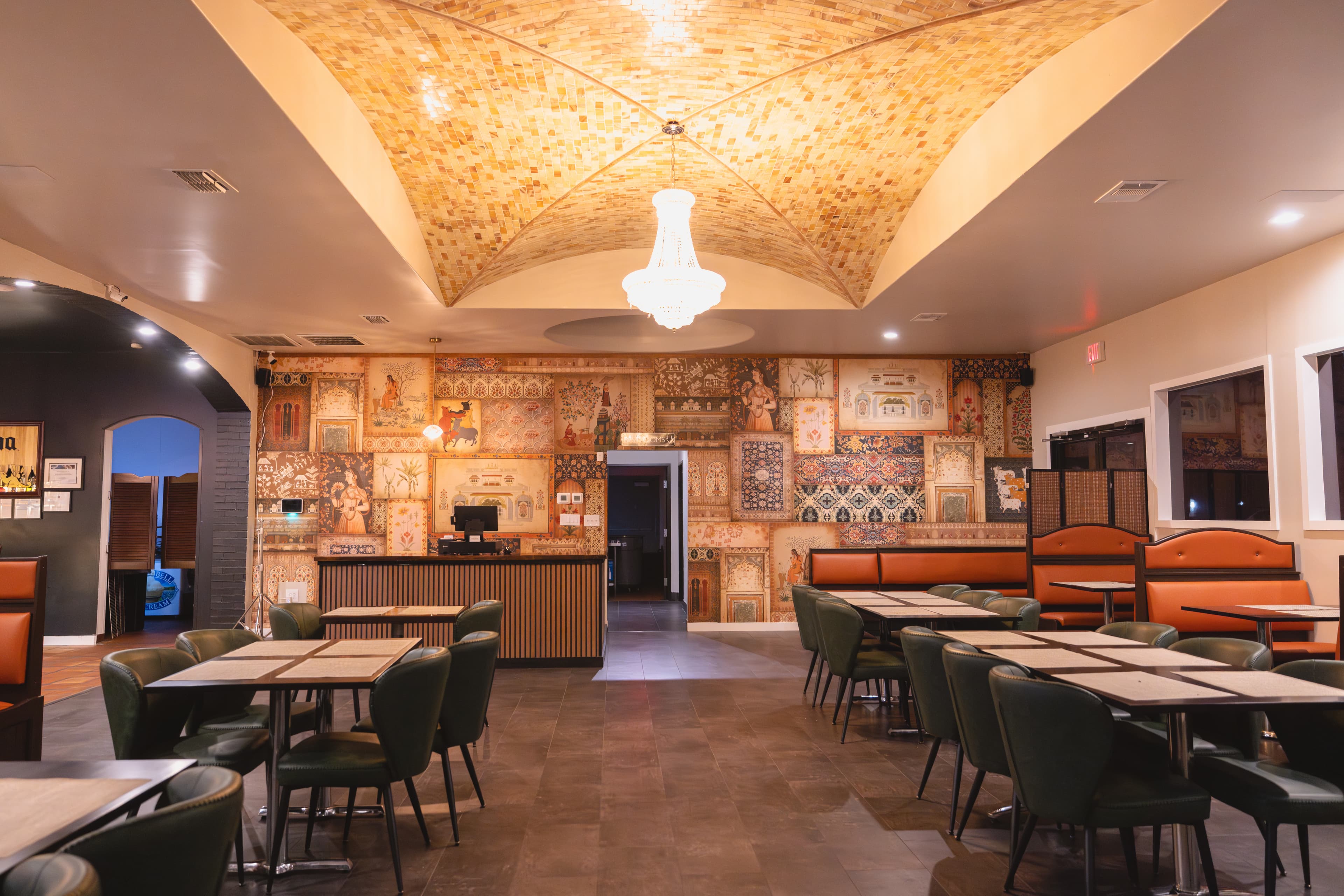 Warm dining area with Indian-inspired decor and ambient lighting