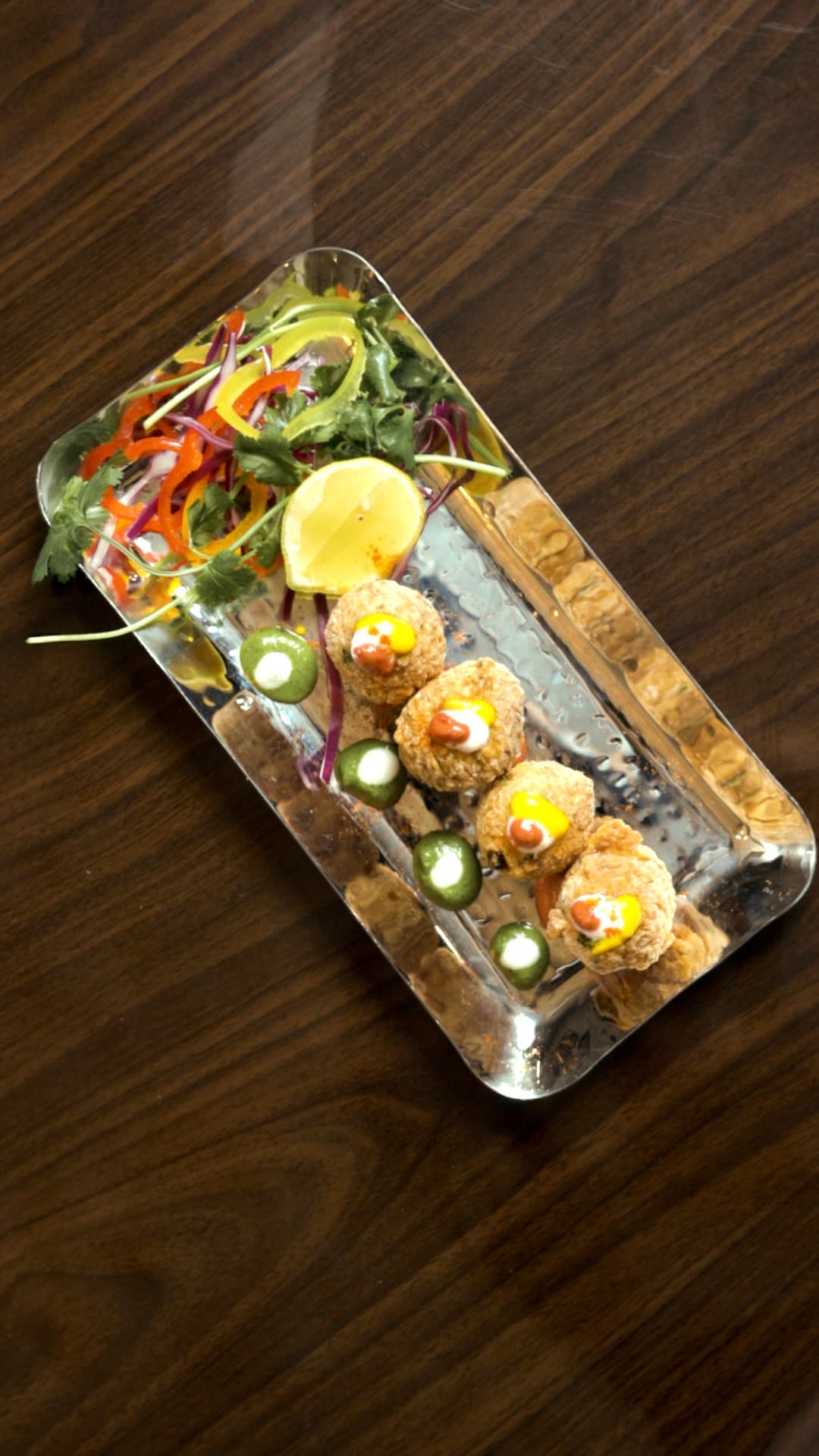 Sizzling tandoori mixed grill with vegetables